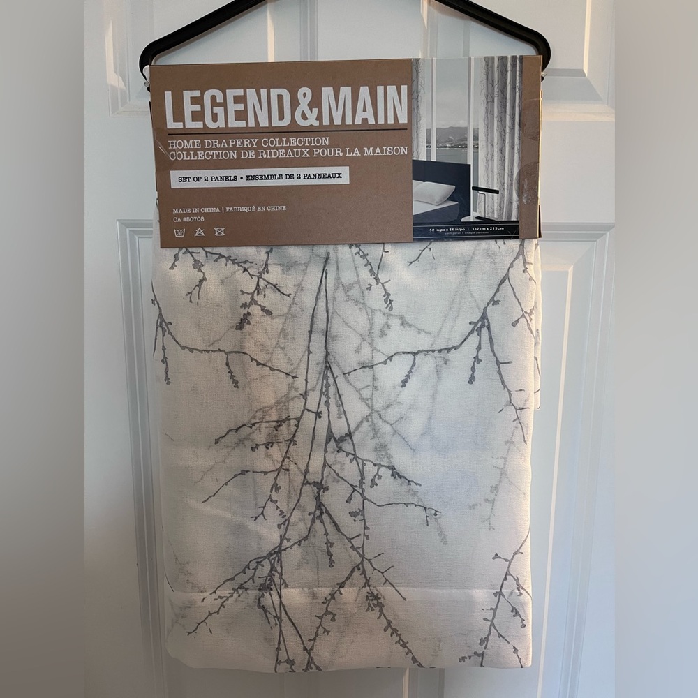 Sheer white curtains with tree pattern